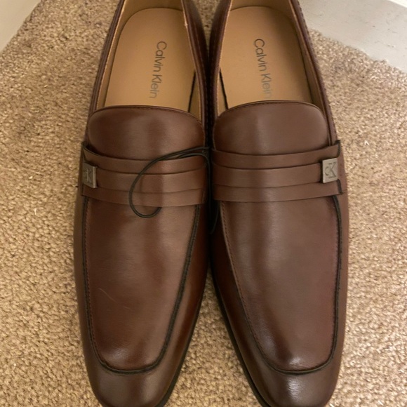 Brand new Calvin Klein men’s brown loafers